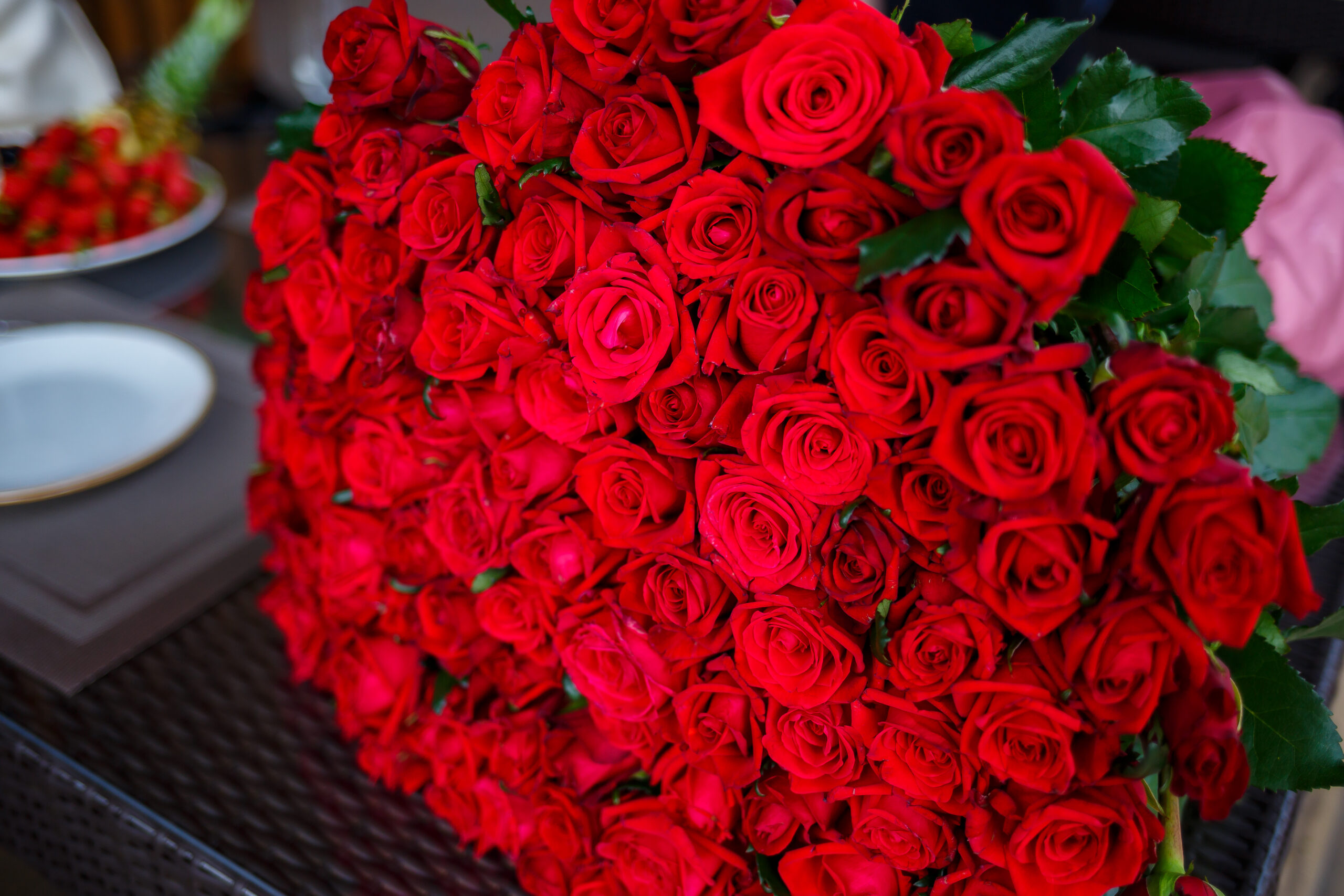 a large bouquet of red roses for a girl, fresh flowers